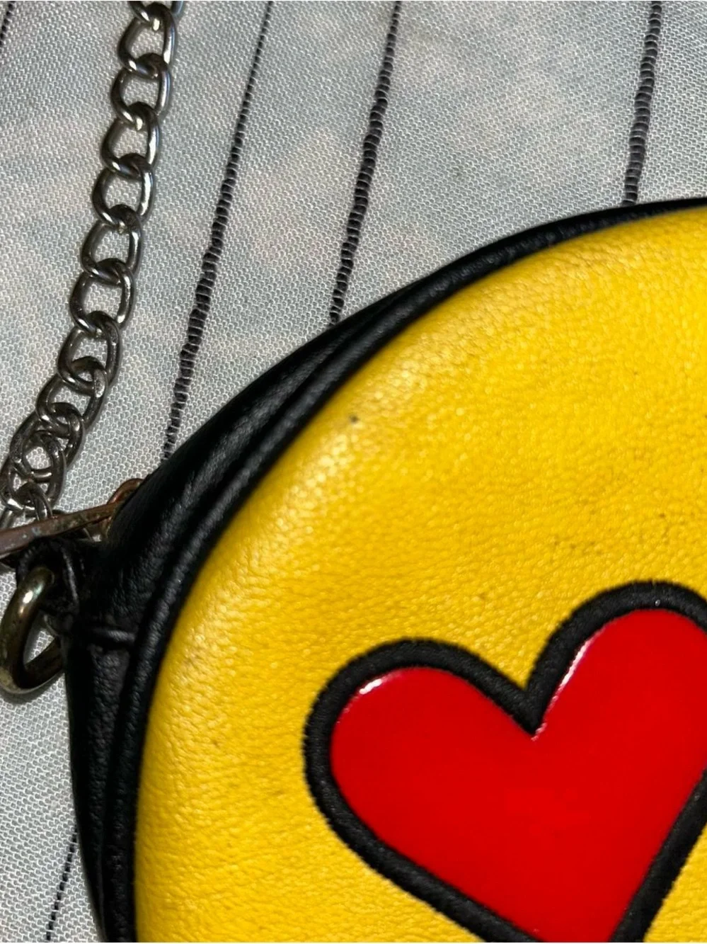 Olivia Miller Yellow Heart-Eyes Emoji Round Crossbody Bag with Black Trim